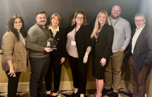João Faustino is honored at the ACH Members Meeting with the 2025 Advocate of the Year Award.